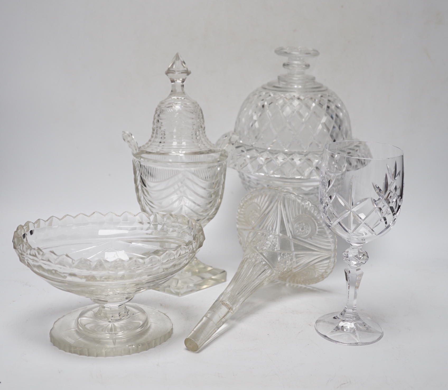 Ten cut glass items including; four pedestal bowls and covers, two oval, pedestal dishes, a two oval, pedestal dishes, a jug, a pair of glasses, etc., tallest, 26cm